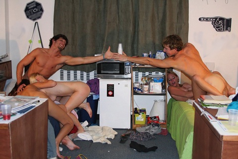 Naked girls having fun in the boys room