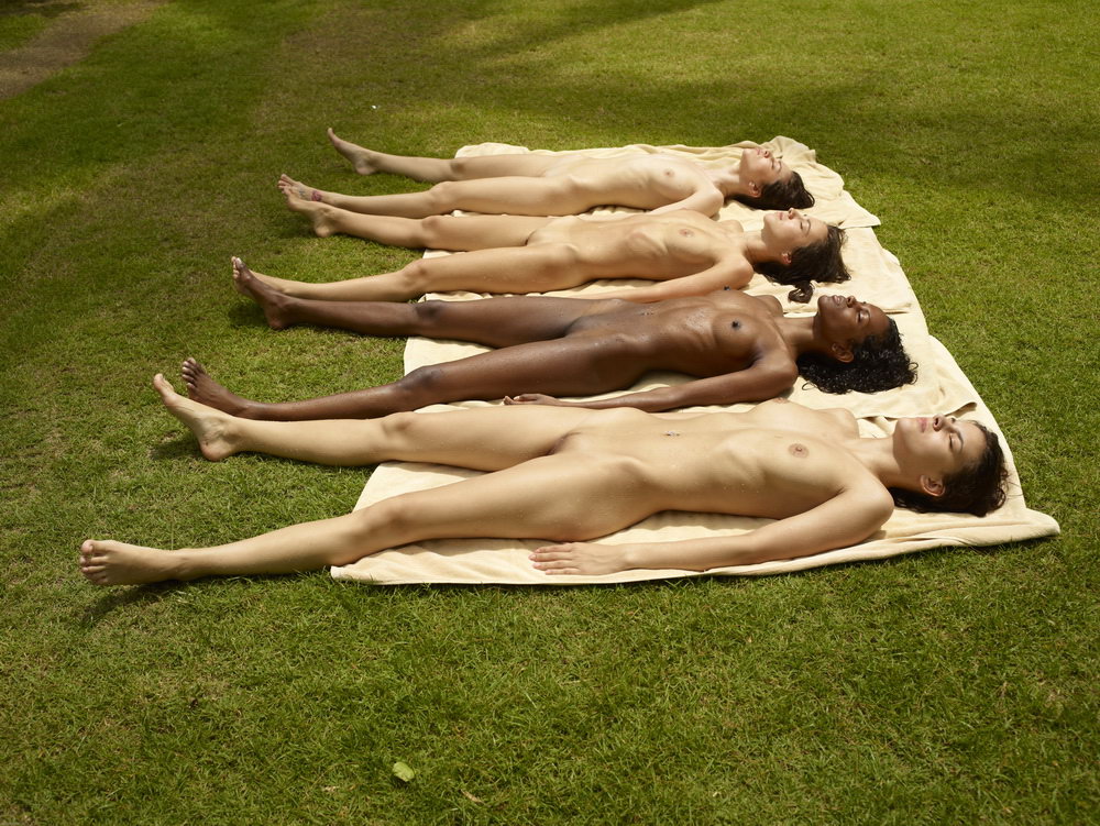 Four breath taking beauties get naked by the pool for the photographer